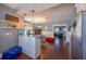Open-concept kitchen with eat-in dining area and seamless flow to the living room at 602 Nw Drane St, Plant City, FL 33563