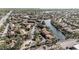 Scenic aerial view of a waterfront community with lush landscaping and tranquil waterways at 6308 Newtown Cir # 8C5, Tampa, FL 33615