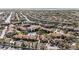 Community aerial view showcasing the beautiful pool, multiple buildings, parking, and lush landscaping at 6308 Newtown Cir # 8C5, Tampa, FL 33615