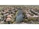 Aerial view of community showcasing waterfront properties, lush landscaping, and proximity to the ocean at 6308 Newtown Cir # 8C5, Tampa, FL 33615