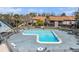 Inviting community pool with lounge chairs, offering a relaxing outdoor space for residents at 6308 Newtown Cir # 8C5, Tampa, FL 33615