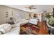 Comfortable living room with plush white couches and colorful rug at 6308 Newtown Cir # 8C5, Tampa, FL 33615
