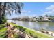 Beautiful waterfront view of the canal with docks and charming residences lining the shore at 6308 Newtown Cir # 8C5, Tampa, FL 33615