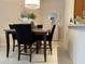 Eat in this cozy dining room with chandelier lighting at 6400 Falcon Lair Dr, North Port, FL 34287