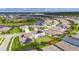 Overhead view of home with solar panels, large backyard, and neighborhood amenities at 7528 Paradiso Dr, Apollo Beach, FL 33572