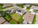 Aerial view of a home showcasing a well-manicured backyard and solar panels on the roof at 7528 Paradiso Dr, Apollo Beach, FL 33572