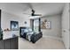 This bedroom features a ceiling fan, a closet, and a window to bring in natural light at 7528 Paradiso Dr, Apollo Beach, FL 33572