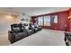 Home theater with comfortable seating and movie-themed decor at 7528 Paradiso Dr, Apollo Beach, FL 33572