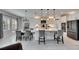 Open kitchen with a large island, modern appliances, and ample cabinet space, perfect for entertaining at 7528 Paradiso Dr, Apollo Beach, FL 33572
