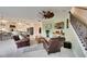 Cozy living space showing open concept design with adjacent kitchen at 7528 Paradiso Dr, Apollo Beach, FL 33572