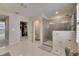 Bright bathroom with a glass enclosed shower and neutral decor at 7528 Paradiso Dr, Apollo Beach, FL 33572