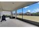 Screened patio with a backyard view at 7528 Paradiso Dr, Apollo Beach, FL 33572