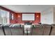 Comfortable home theater seating faces a large screen, perfect for movie nights at 7528 Paradiso Dr, Apollo Beach, FL 33572
