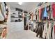 Large walk-in closet with custom shelving and ample storage space at 7528 Paradiso Dr, Apollo Beach, FL 33572