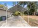 Carport attached to the house with side entrance at 9641 Fulton Ave, Hudson, FL 34667