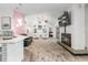 Bright living space with a breakfast bar, modern lighting, and cozy seating arrangements at 9641 Fulton Ave, Hudson, FL 34667
