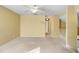 Loft with neutral carpet and view of staircase at 11444 Village Brook Dr, Riverview, FL 33579