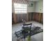 Bedroom renovation project shows studs, items on the floor, and window light at 200 Country Club Dr # 903, Largo, FL 33771