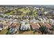 Aerial view featuring beautiful homes and golf course highlighting the community's design and amenities at 2435 E Del Webb Blvd, Sun City Center, FL 33573