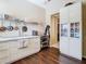 Elegant kitchen featuring white cabinets, stylish hardware, and ample counter space at 25950 Risen Star Dr, Wesley Chapel, FL 33544