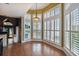 Bright dining nook with large windows and wood floors located off the gourmet kitchen at 3115 W Fair Oaks Ave, Tampa, FL 33611