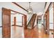 Spacious foyer boasting hardwood floors, stylish staircase, wood accents, and decorative lighting at 3115 W Fair Oaks Ave, Tampa, FL 33611