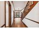 Spacious foyer with hardwood floors, staircase and trim, and bright natural light at 3115 W Fair Oaks Ave, Tampa, FL 33611