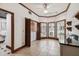 Well-lit laundry room with washer/dryer, sink, shuttered windows and trim at 3115 W Fair Oaks Ave, Tampa, FL 33611
