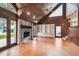 Living room with vaulted wood ceiling, stone fireplace and built in cabinets at 3115 W Fair Oaks Ave, Tampa, FL 33611