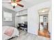 Bright bedroom with a built-in closet office nook and light wood flooring at 349 Shirley Ave, Belleair, FL 33756