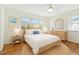 Inviting bedroom with a comfortable bed, natural light, and stylish furnishings at 349 Shirley Ave, Belleair, FL 33756