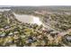 An aerial view of the neighborhood shows the waterfront property's location at 3907 Elkcam Se Blvd, St Petersburg, FL 33705