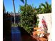 A cozy patio featuring an outdoor seating area and vibrant foliage, perfect for relaxing outdoors at 468 Boca Ciega Point S Blvd, St Petersburg, FL 33708