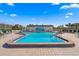 This exterior shot shows the pool with clear blue sky in the background at 468 Boca Ciega Point S Blvd, St Petersburg, FL 33708