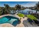Backyard pool with dock at 4937 Dover Ne St, St Petersburg, FL 33703