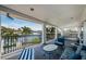 Spacious balcony with iron railing, plenty of comfortable seating and waterfront views at 4937 Dover Ne St, St Petersburg, FL 33703