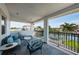 Comfortable outdoor seating on balcony overlooking water at 4937 Dover Ne St, St Petersburg, FL 33703