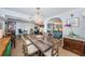 Open-concept dining room connecting to the kitchen and living areas, great for a seamless entertaining experience at 4937 Dover Ne St, St Petersburg, FL 33703