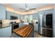Modern kitchen with stainless steel appliances, granite countertops, and ample cabinet space for all your culinary needs at 4937 Dover Ne St, St Petersburg, FL 33703