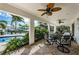 Covered patio with tropical views including a pool and canal at 4937 Dover Ne St, St Petersburg, FL 33703