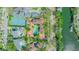Estate is on a well-landscaped lot with mature trees, tennis court, pool, and stunning water views at 5020 S Shore Crest Cir, Tampa, FL 33609