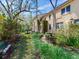Multi-unit building with well-maintained landscaping and mature trees providing ample shade at 5020 S Shore Crest Cir, Tampa, FL 33609