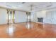 Large living room with hardwood floors and a decorative fireplace at 5020 S Shore Crest Cir, Tampa, FL 33609