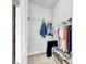 Organized closet featuring shelves and hanging space for clothing and shoe storage at 5317 Del Coronado Dr, Apollo Beach, FL 33572