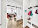 Organized mud room area with storage, perfect for keeping things tidy and separate from office area at 5317 Del Coronado Dr, Apollo Beach, FL 33572