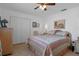 Bedroom with ceiling fan, closet and hardwood floors at 5357 Kirkwood Ave, Spring Hill, FL 34608