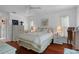 Bright bedroom with ceiling fan and hardwood floors at 5357 Kirkwood Ave, Spring Hill, FL 34608