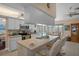 Spacious kitchen featuring a breakfast bar with seating, modern appliances, and a view of the pool at 5357 Kirkwood Ave, Spring Hill, FL 34608