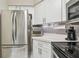 Well-equipped kitchen boasting stainless steel appliances and ample counter space at 6916 Stonesthrow N Cir # 9103, St Petersburg, FL 33710