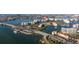 Aerial view of the waterfront properties featuring bridge access, boat docks and calm waters at 7902 Sailboat Key S Blvd # 206, South Pasadena, FL 33707